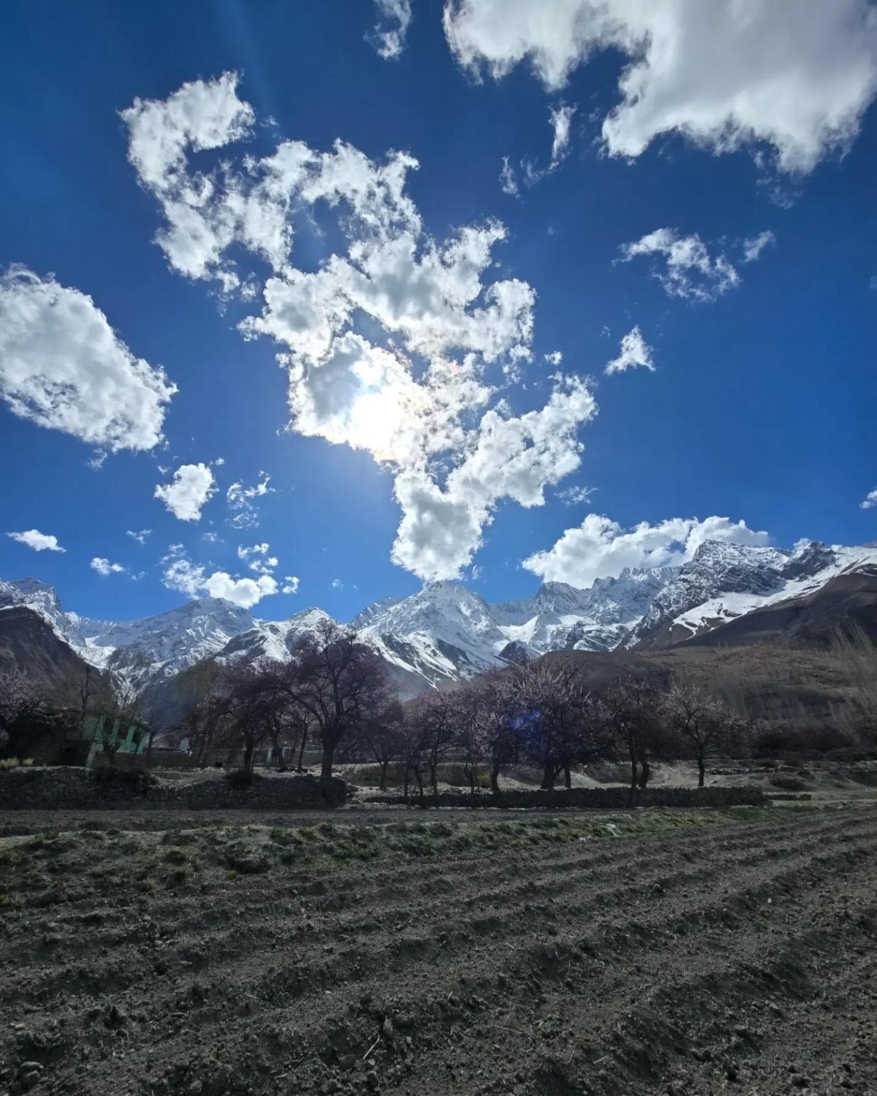 Open fields and enormous clouds over Basho Valley, Baltistan