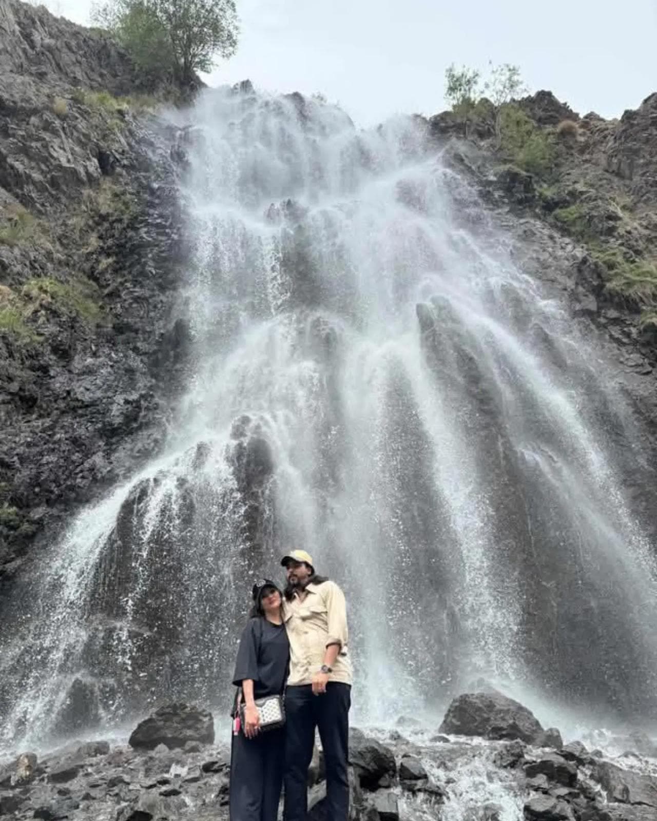 Travellers at the Manthoka waterfall in Kharmang, near Skardu