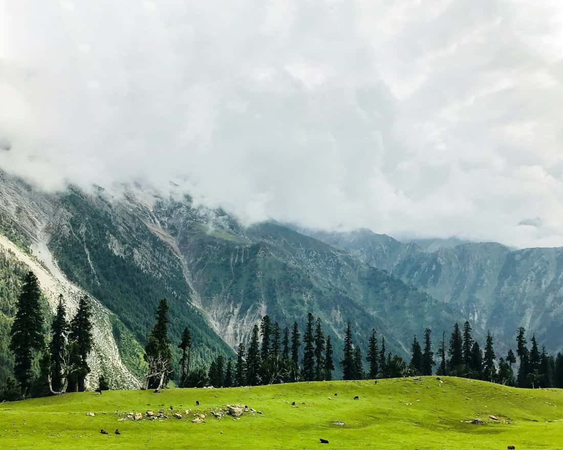 Travellers overlooking a northern Pakistan valley