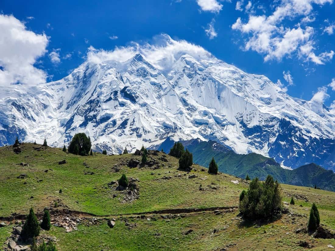 Camp with a view of snow-capped peaks